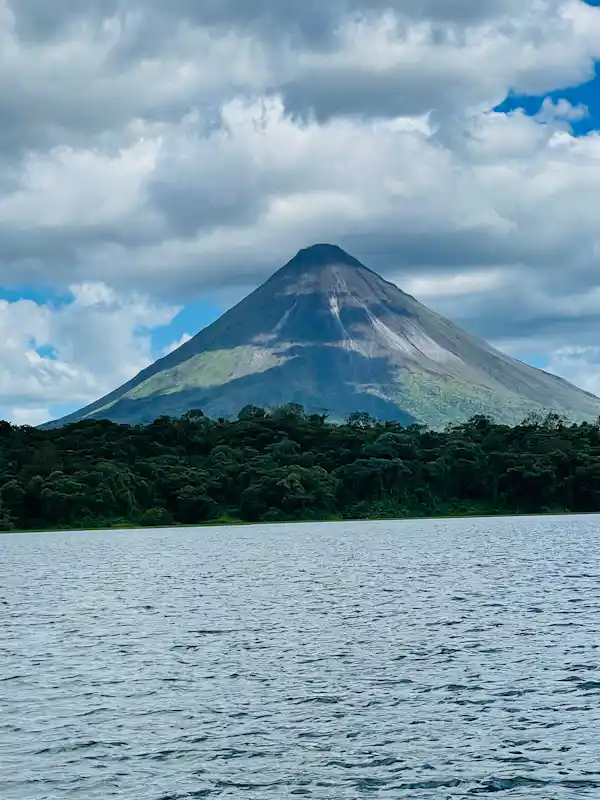 Diverse volcanic ecosystems and unique plant life thriving around the base of the Arenal Volcano