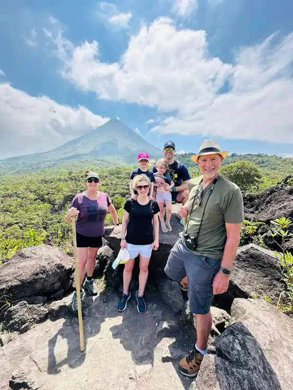 Guided group exploring the rugged terrain of the lava fields with a professional Costa Rican guide
